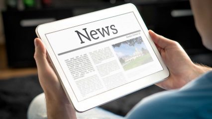 A news article on a table
