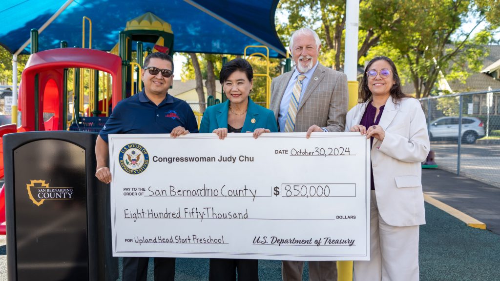 Jesse Armendarez and others holding up an large check of 850,000 dollars for Upland Head Start Preschool.
