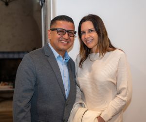 Jesse Armendarez smiling next to a woman.
