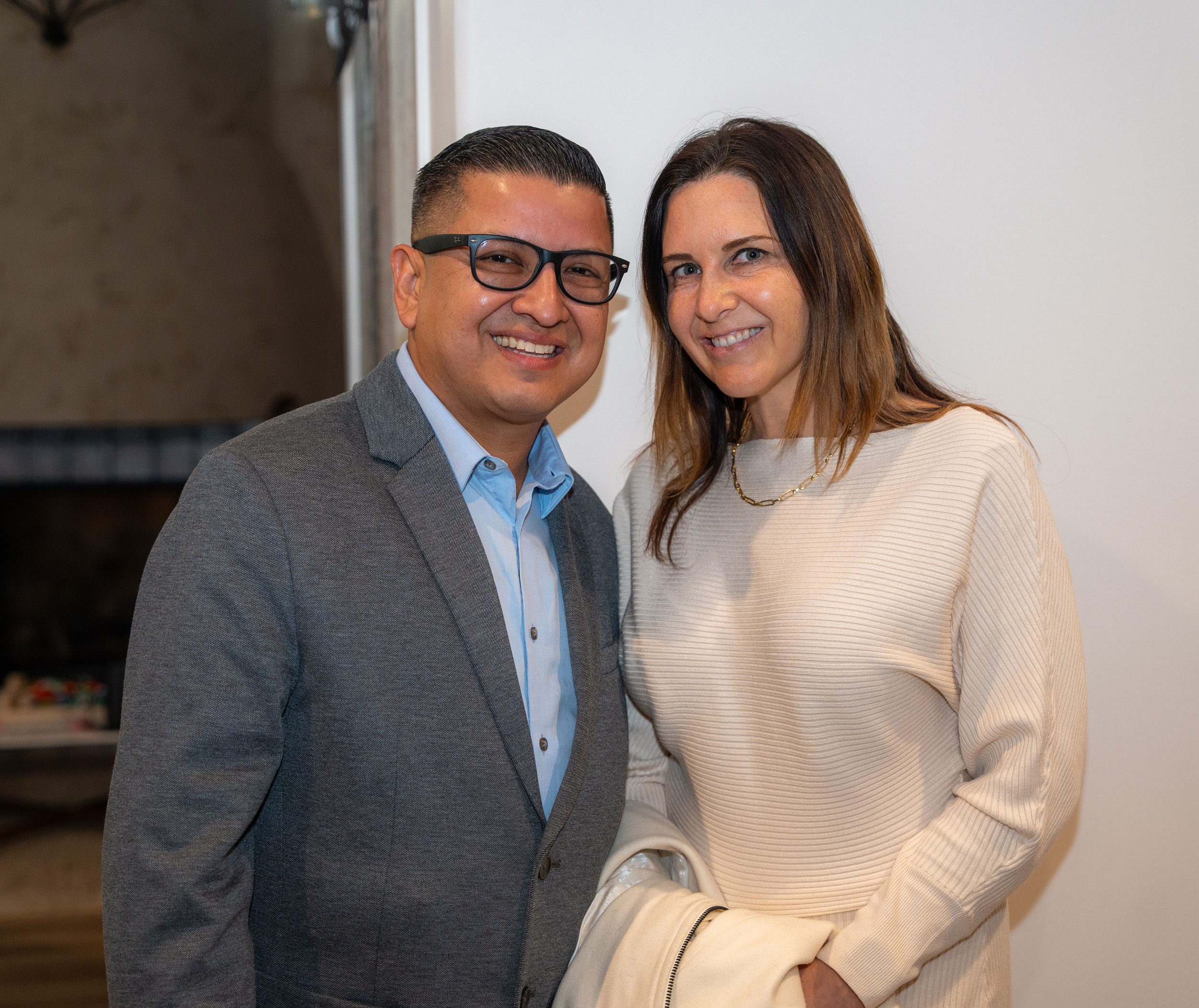 Jesse Armendarez smiling next to a woman.