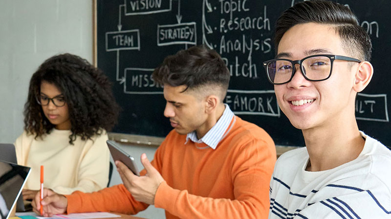 Young adults at a conference table